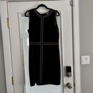 Calvin Klein black dress with gold studs! Only worn twice. Excellent condition.